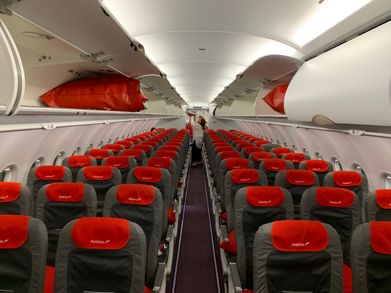 an airplane with red and black seats