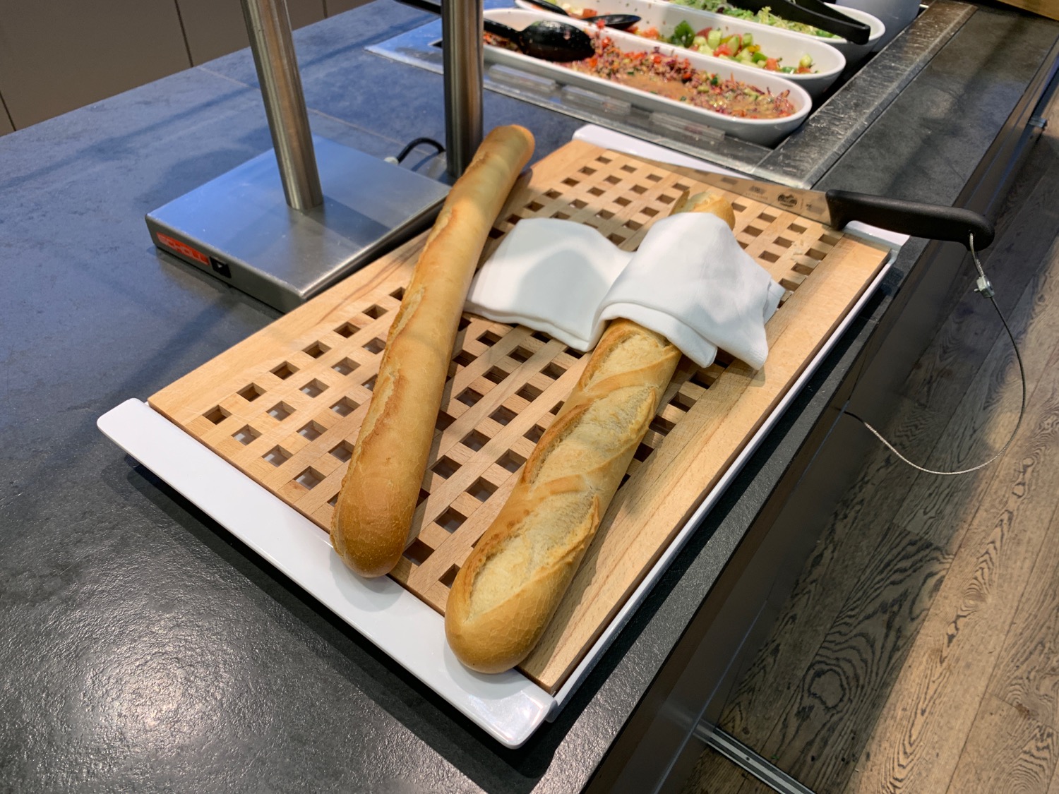 a baguette on a cutting board
