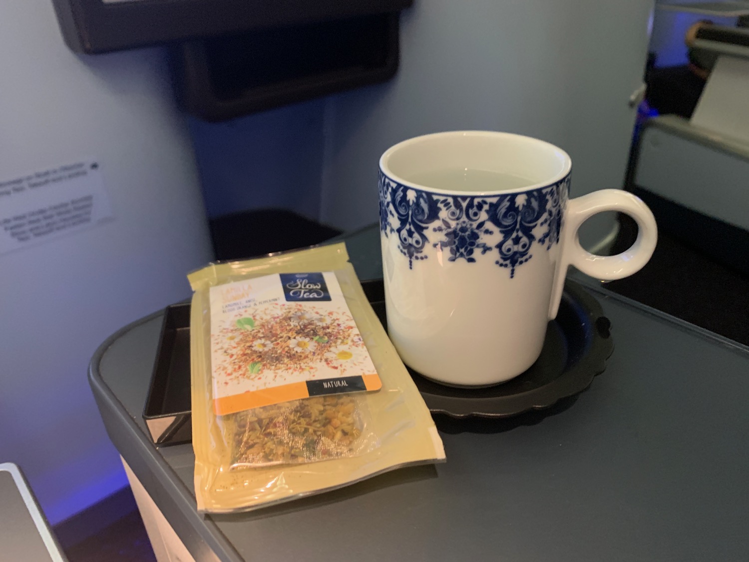 a cup and a bag of tea
