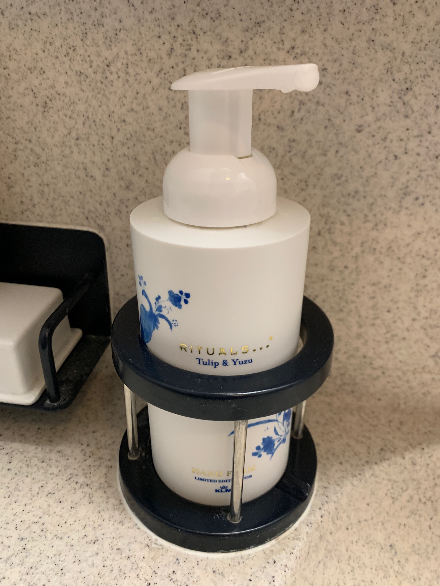 a soap dispenser on a counter
