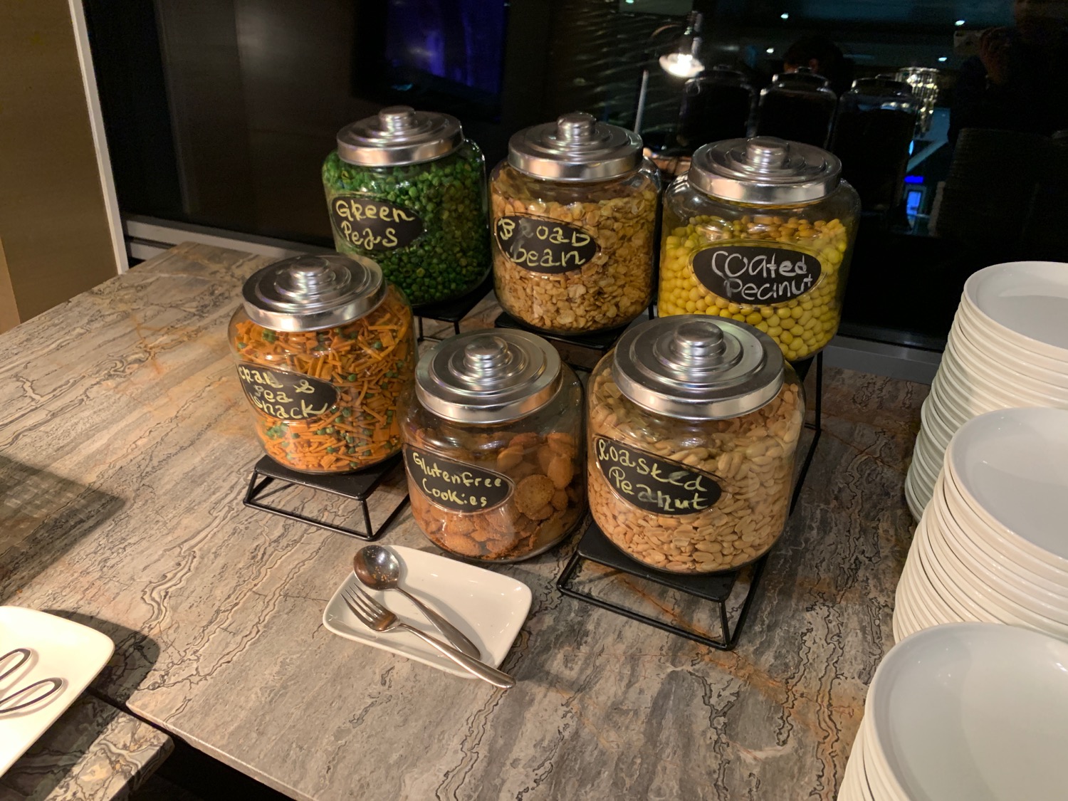 a group of jars with different types of food