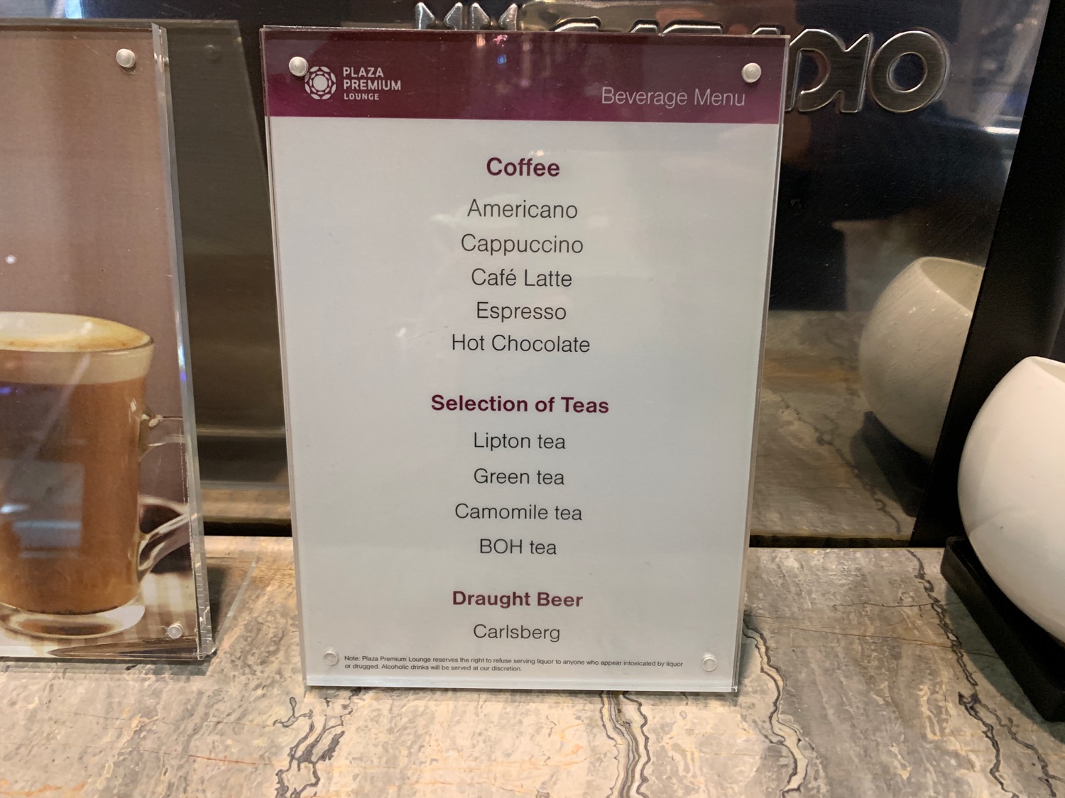 a menu sign on a counter