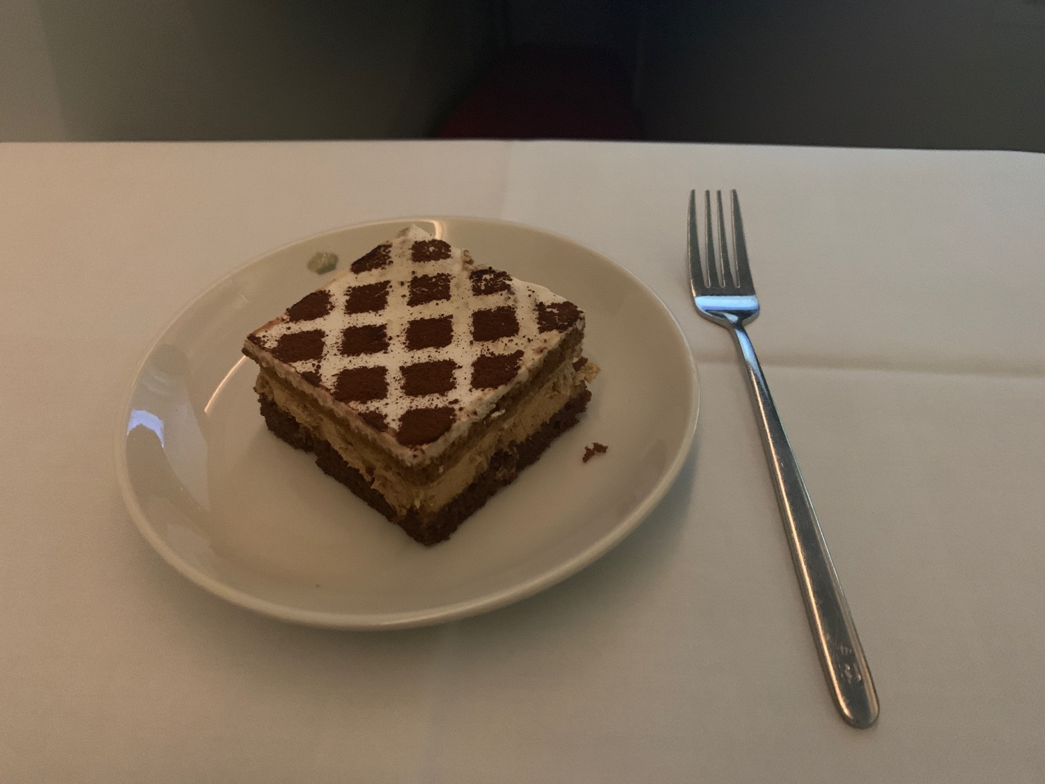 a plate with a piece of cake on it