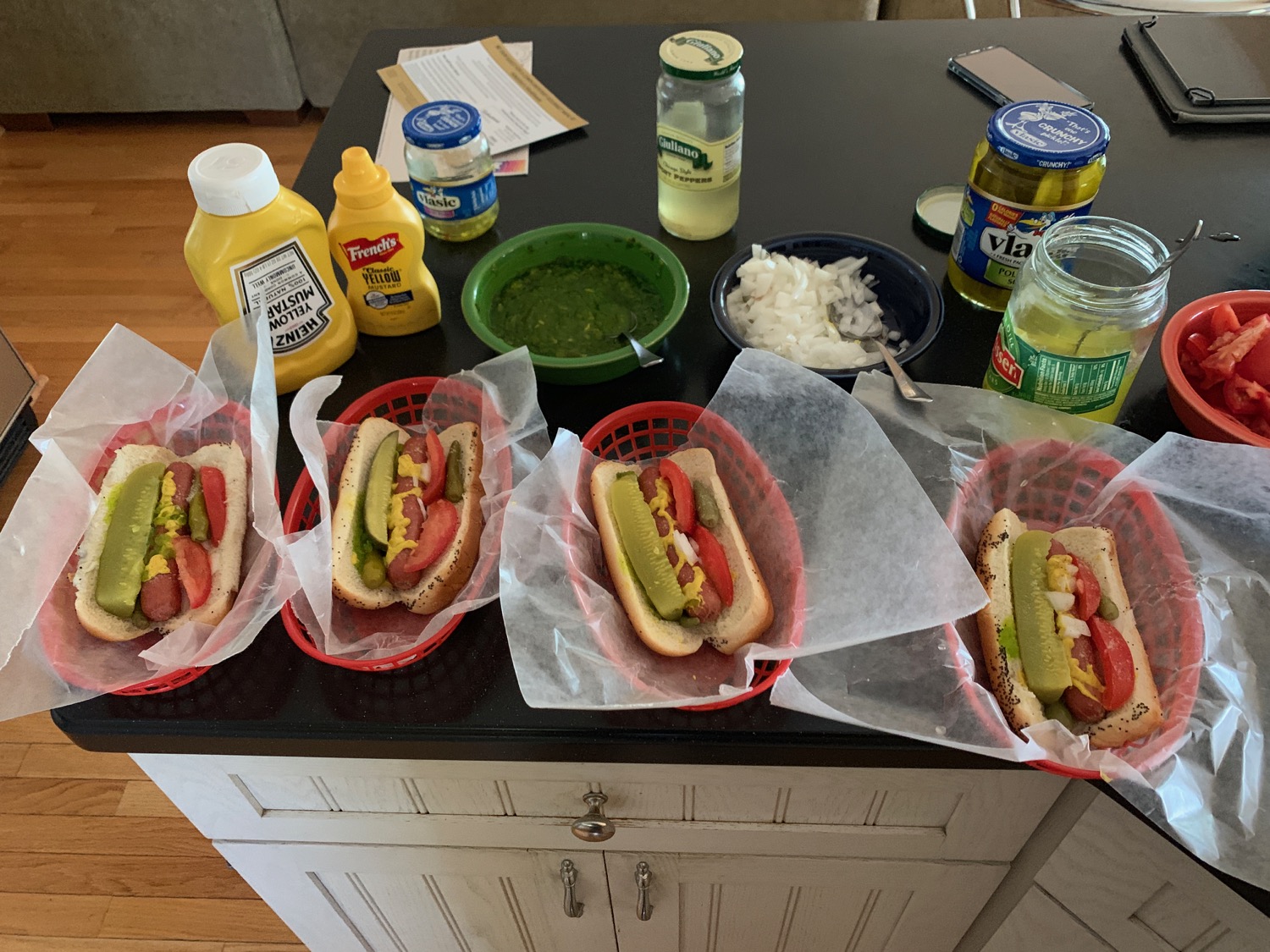 a group of hot dogs on a counter