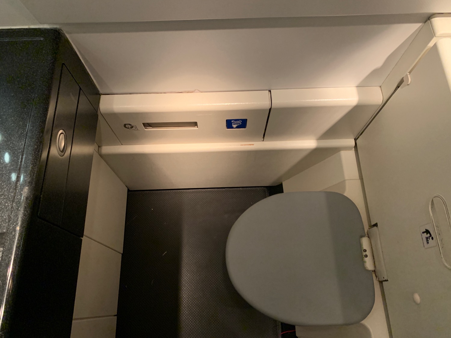 a toilet in a small bathroom
