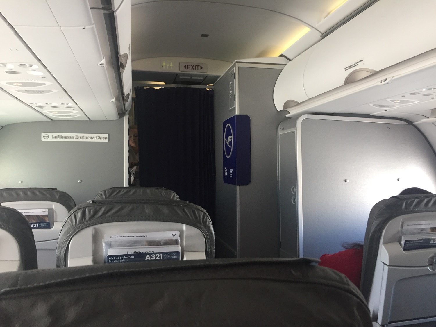 an airplane with seats and a person in the back