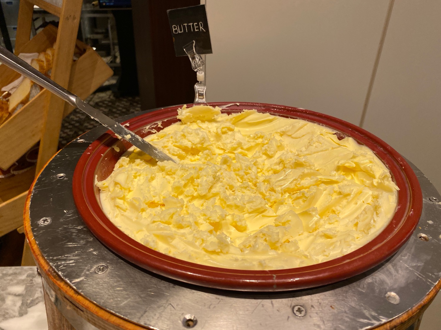 a bowl of butter on a table
