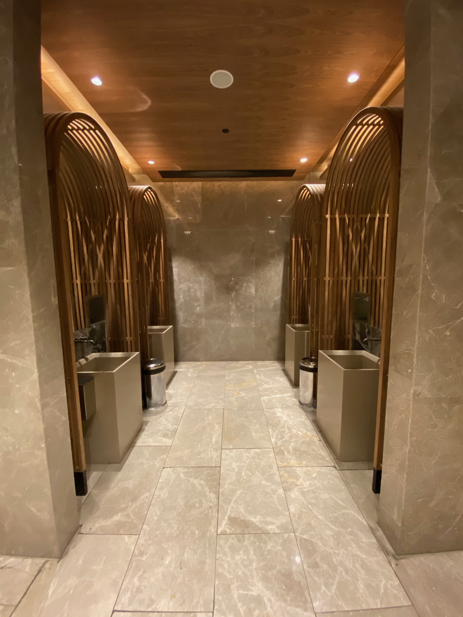 a bathroom with urinals and urinals