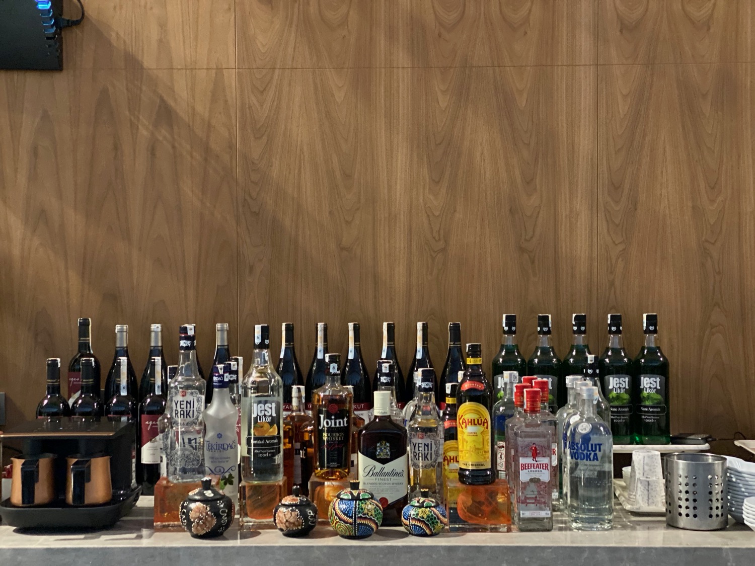 a group of bottles of alcohol on a table