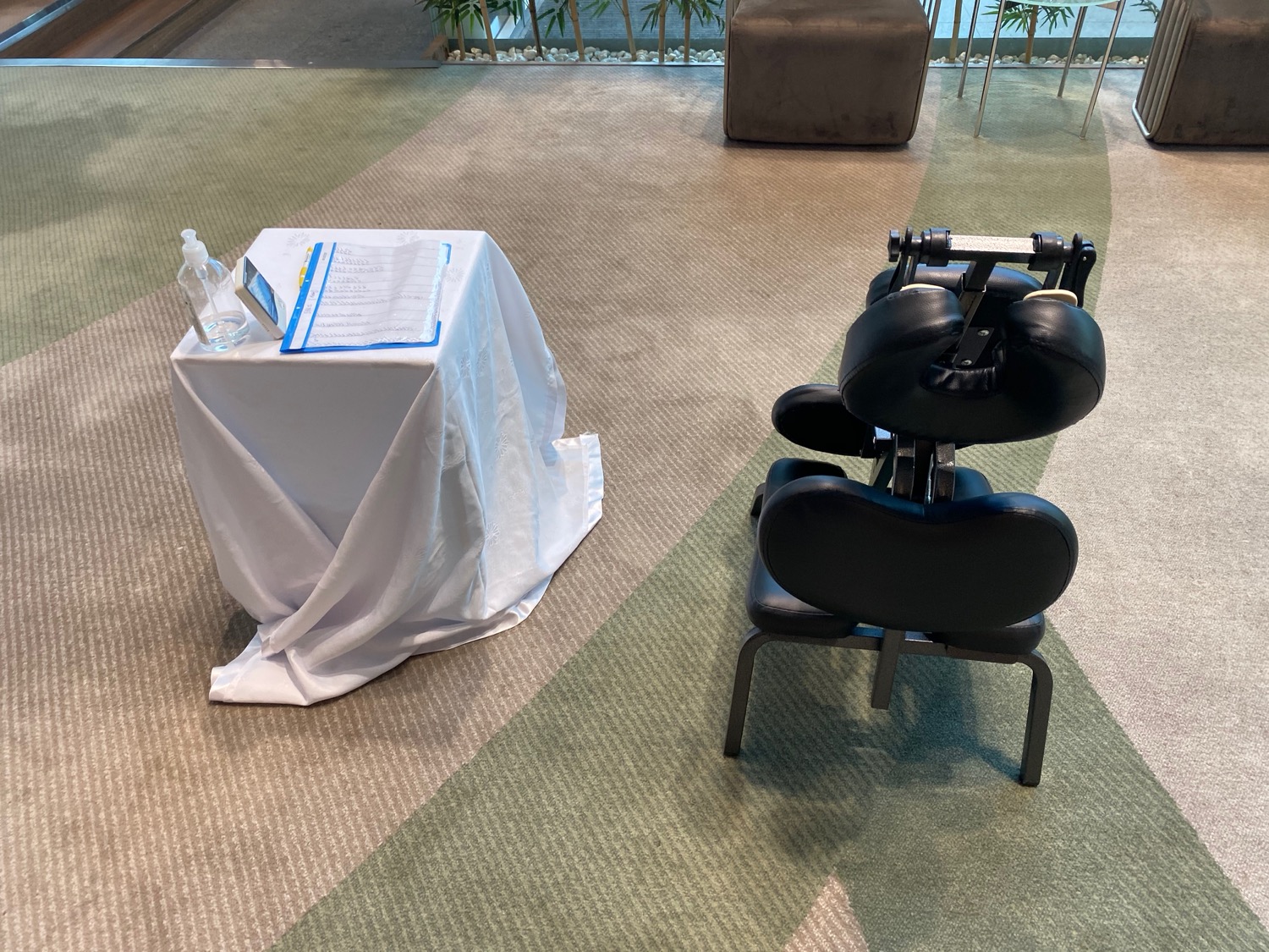 a massage chair and a table