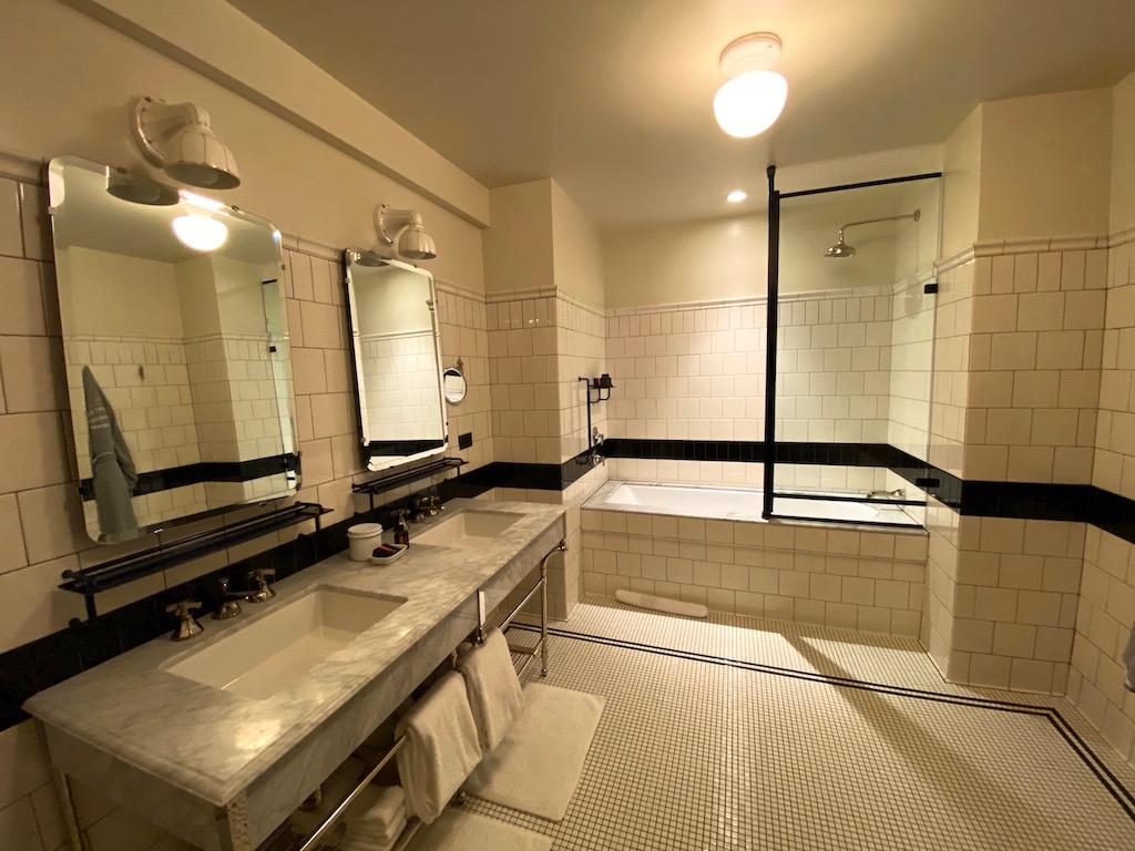 Large, white tile bathroom