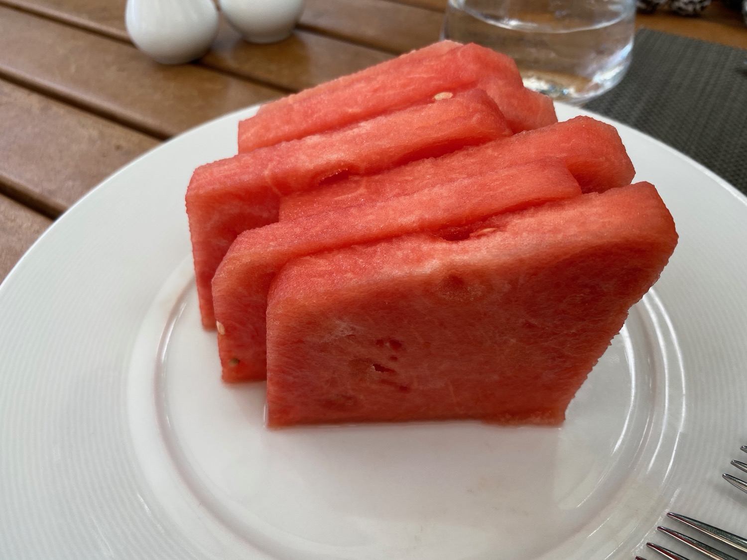 a plate of watermelon slices