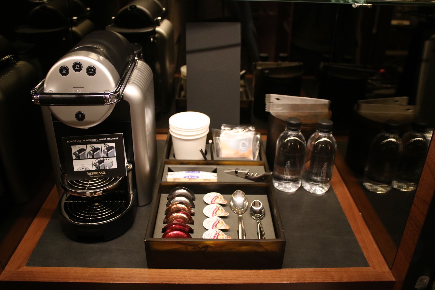 a coffee machine and a tray of coffee
