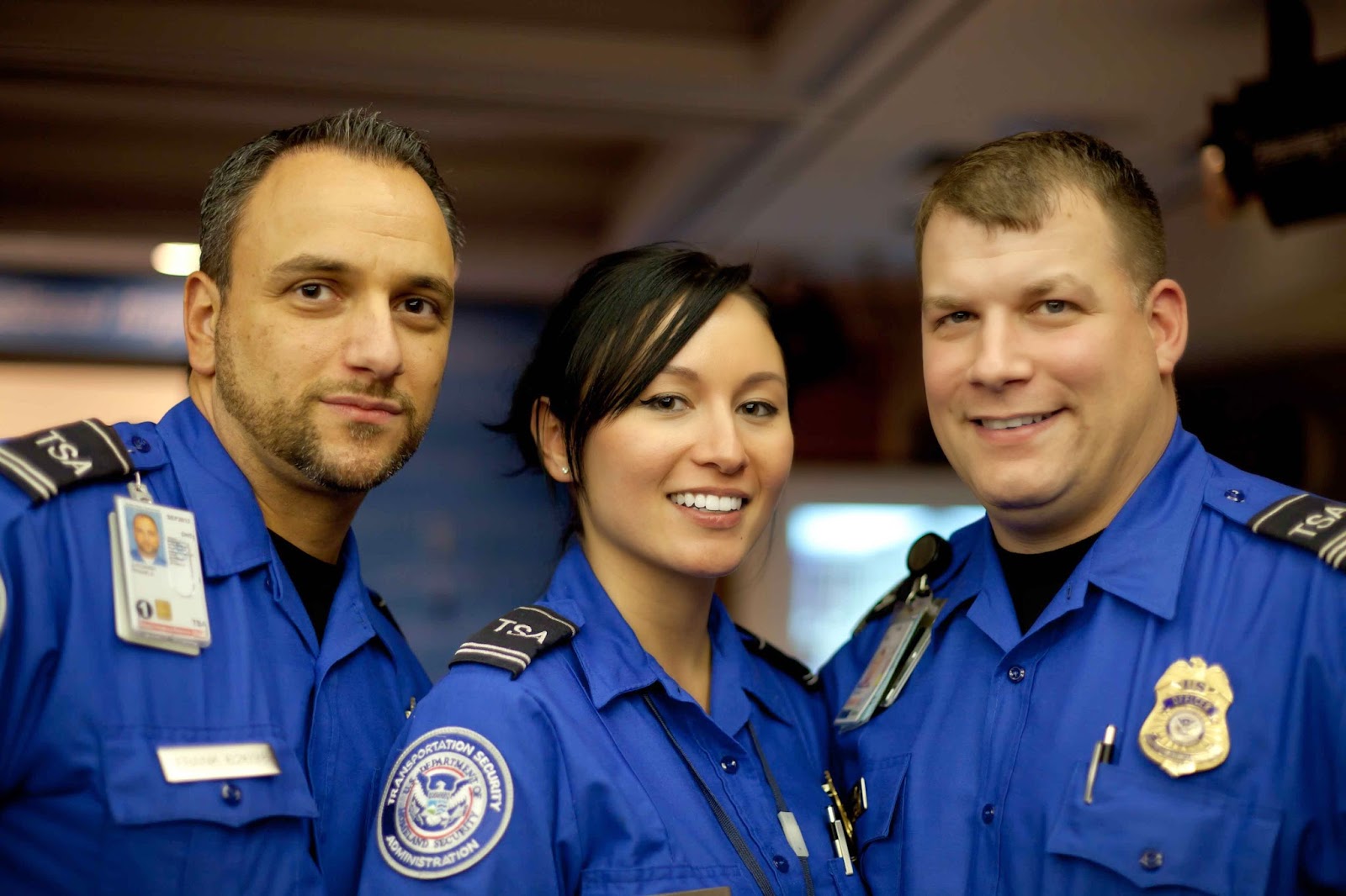 a group of people wearing blue uniforms
