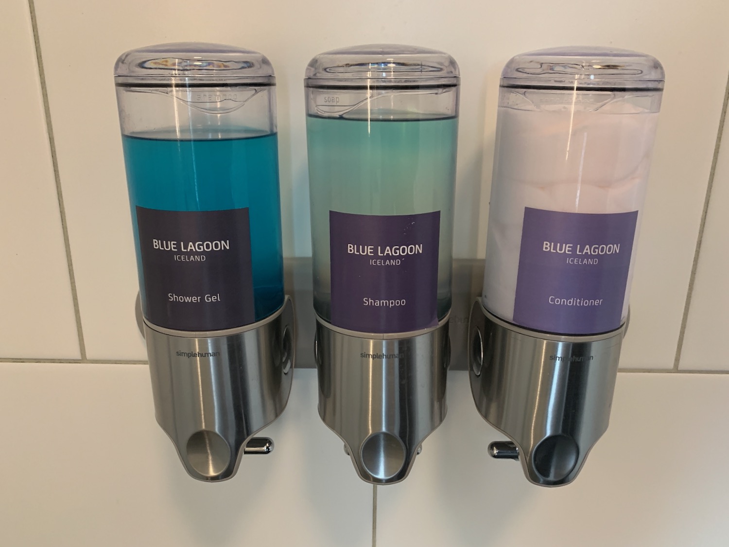 a group of soap dispensers