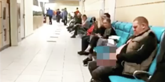 Man Urinates Airport
