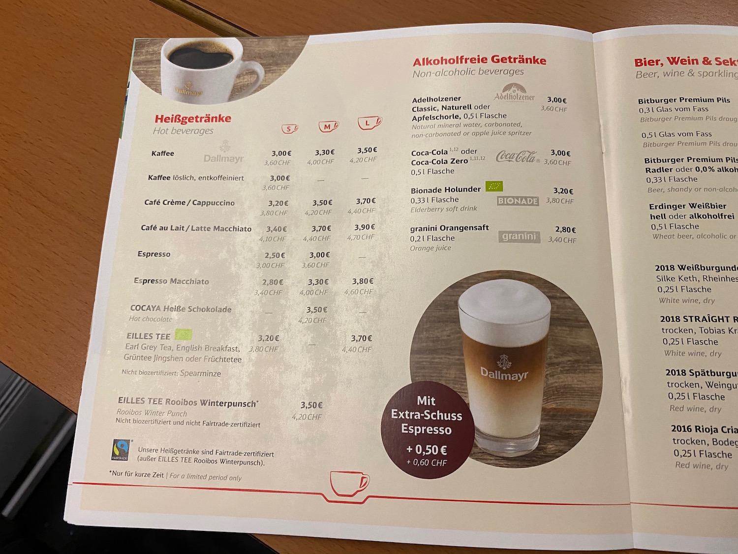 a menu with a picture of a cup of coffee and a picture of a drink