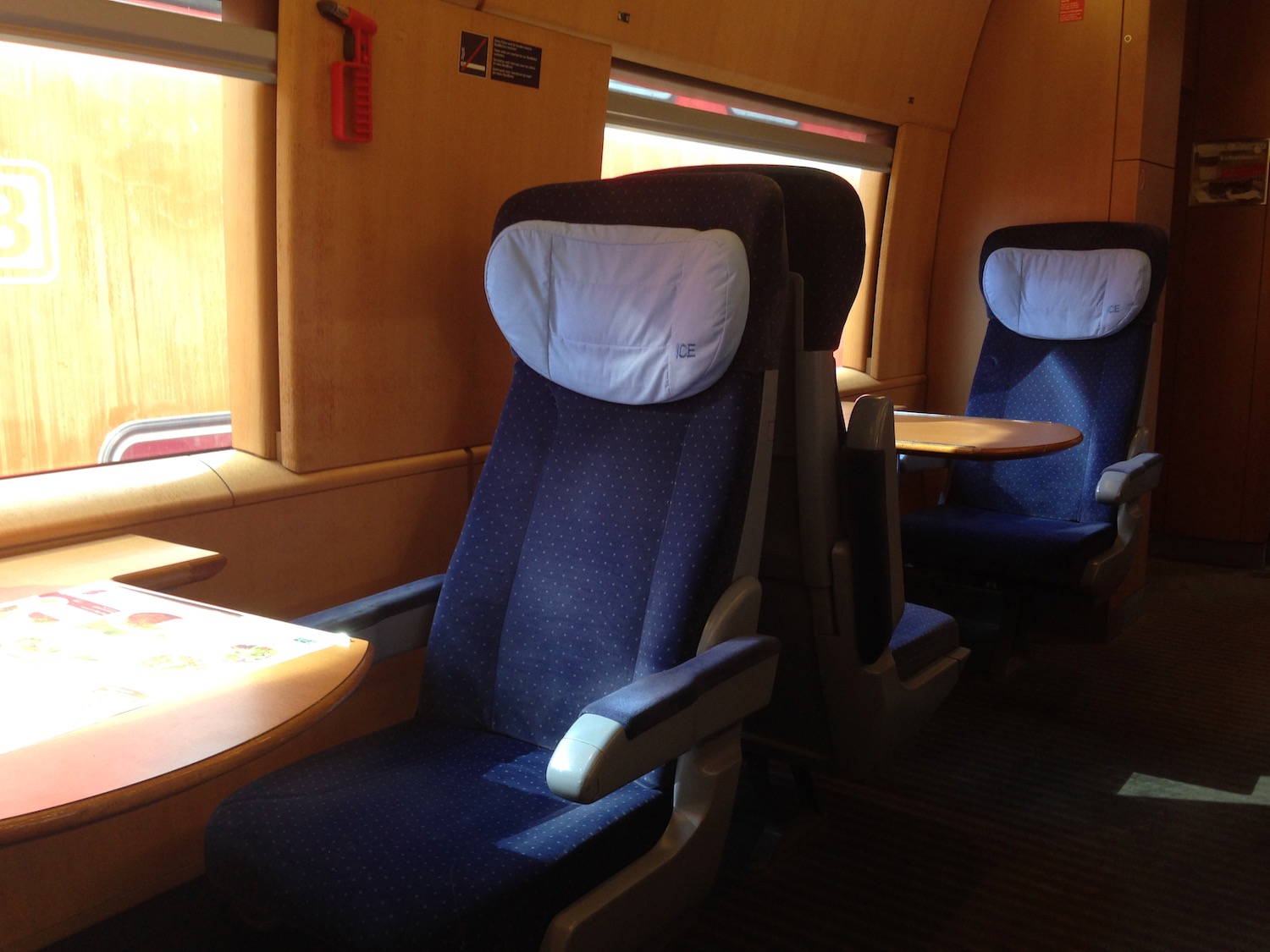 a seats and tables in a train