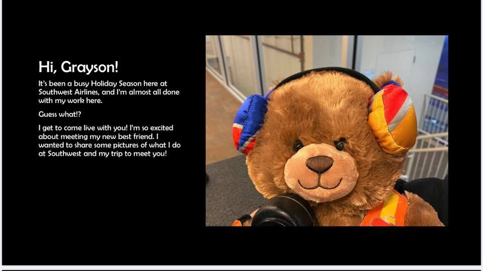 a stuffed bear wearing headphones