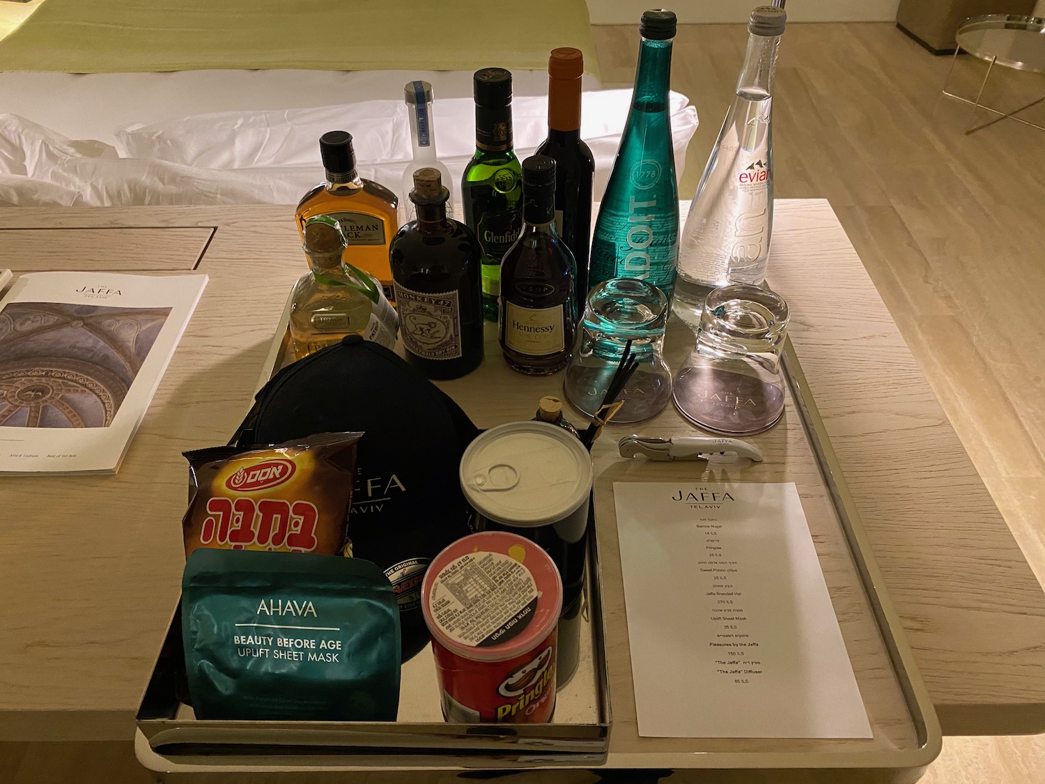 a tray with bottles and food on it