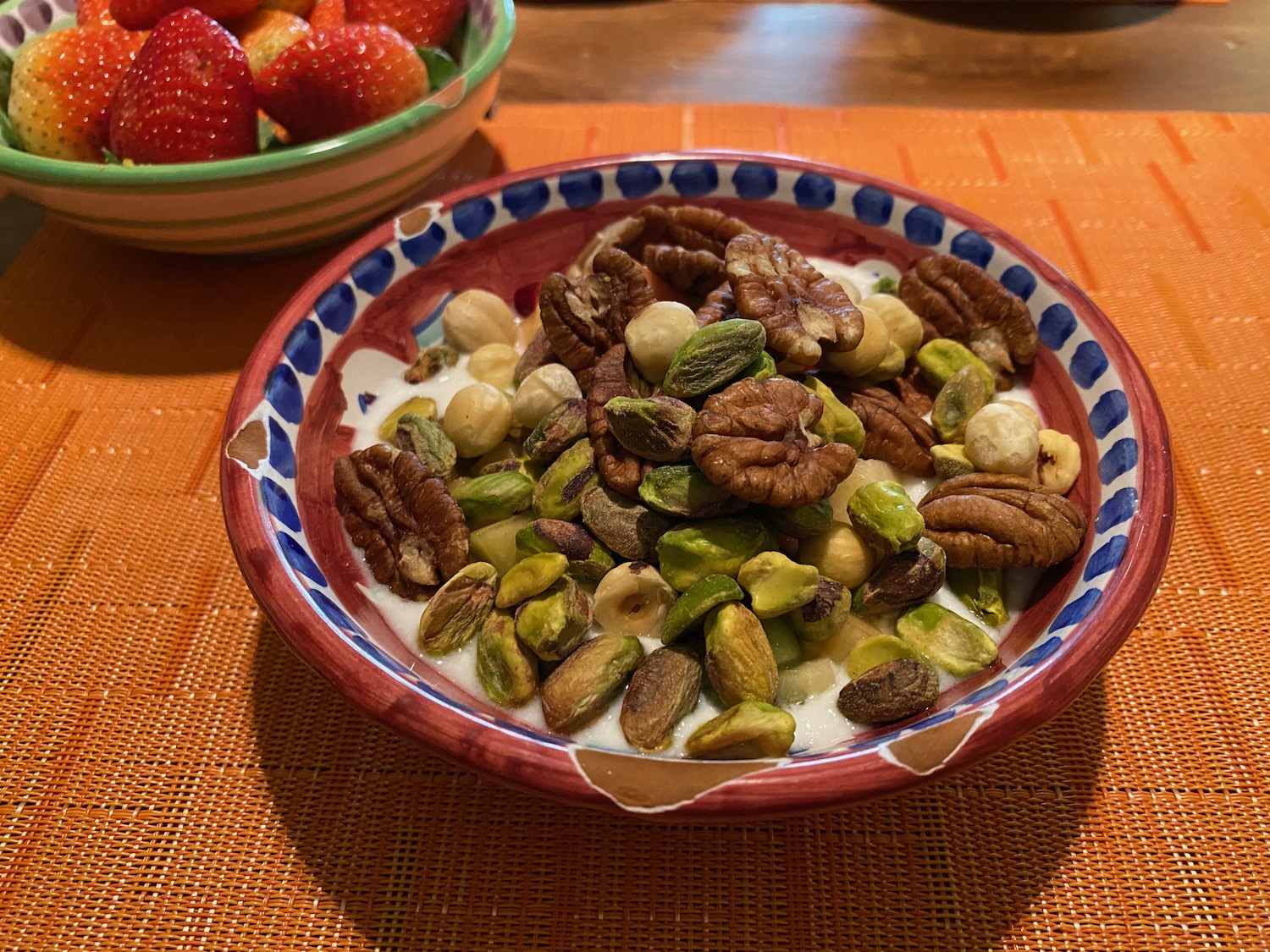 a bowl of nuts and milk