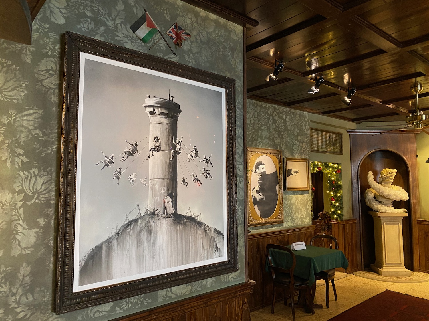 a room with a picture of a tower and a table