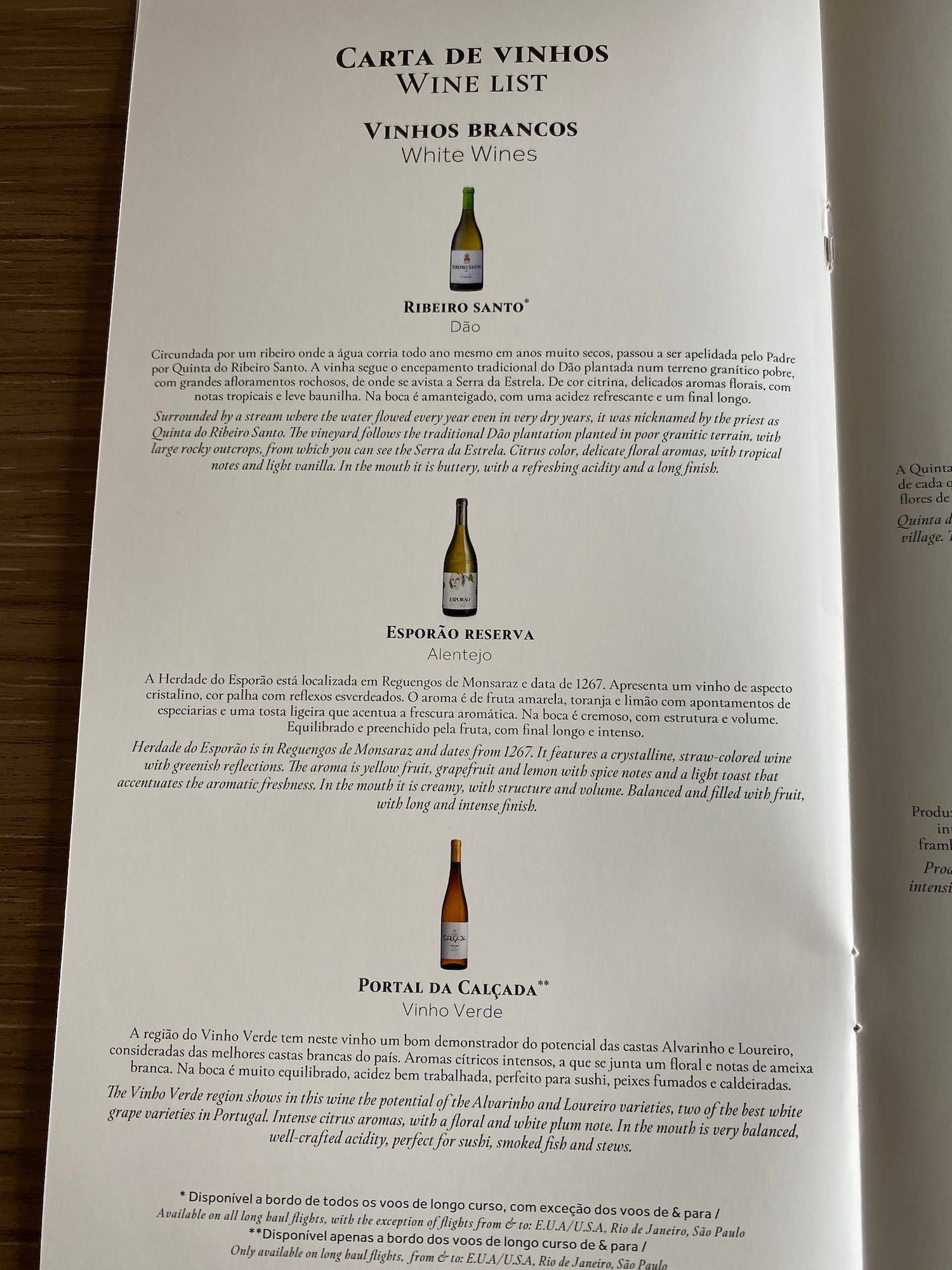 a menu with text and pictures of bottles