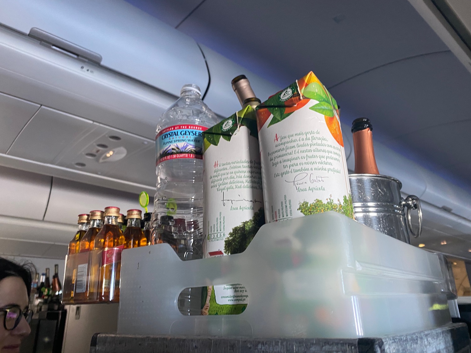 a tray of beverages on an airplane