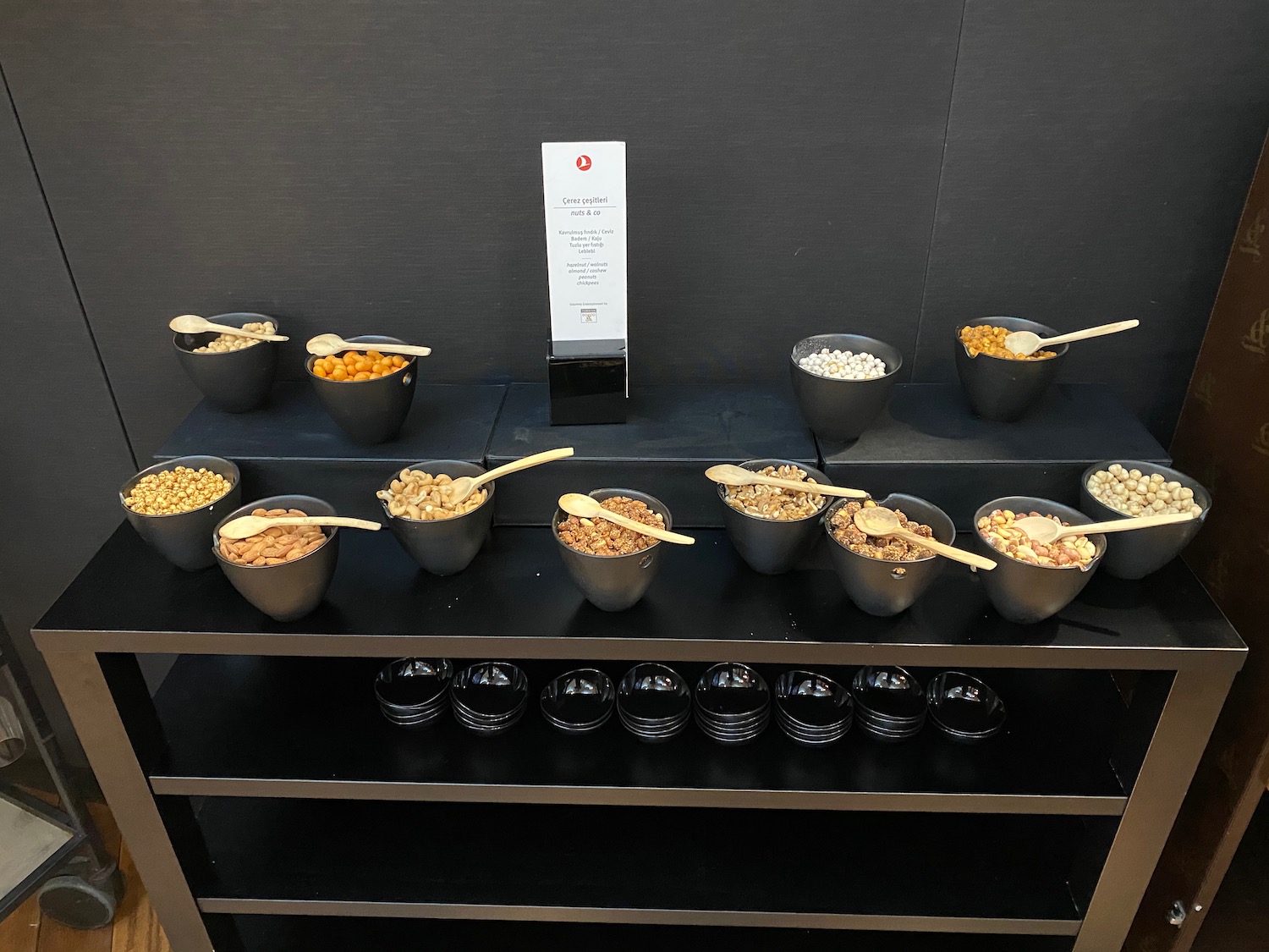 a shelf with bowls of food